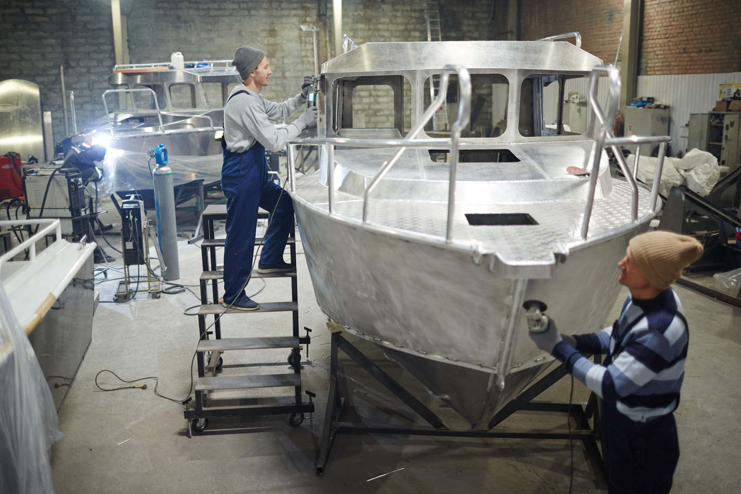 men making boat WLMPQRT